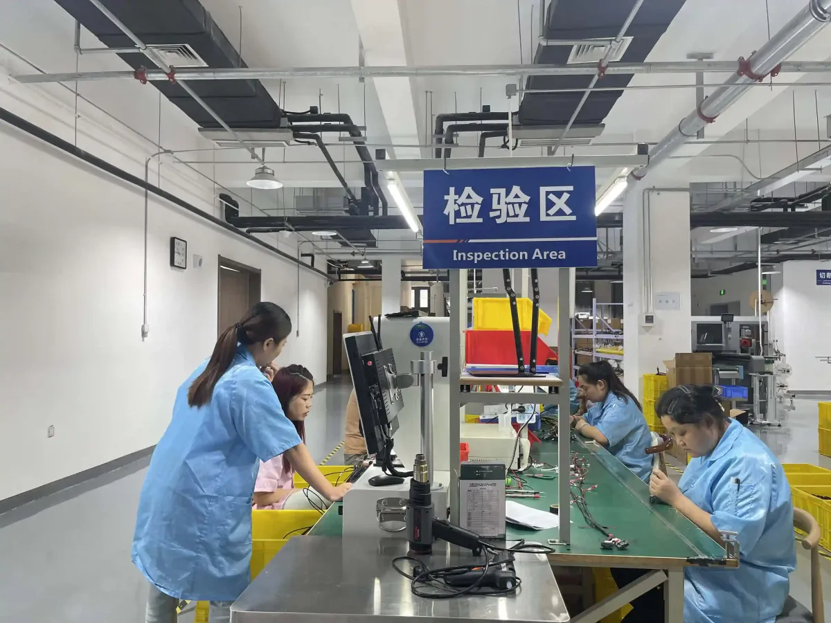 Cable assembly quality control inspection station with dimensional and continuity testing